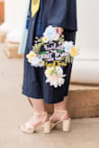 I bought these for a nice neutral pair of heels as my boyfriends sister had her bachelorette party coming up (canceled because of COVID), I was graduating from college, and I was going to wear them as my bridesmaids shoes in her wedding as well. So far I have only wore them for my senior pictures but I was in love! So comfortable and pretty! The platform really helps make sure your feet and ankles aren't strained at an ungodly angle and they photograph great! Just wishing there were more colors so I could get them all! Most comfortable heels I own and I have big and really wide feet. - Shelby S.