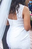 It fits my curves perfectly. There's no stretch in the dress which worked well for me. It emphasizes all my curves. - Latoya F.