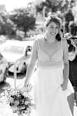 I went wedding dress shopping with my girls (did the whole appointment and champagne thing) and I just wasn't sold on any of them. Dresses were $500- $1500 that I was looking at and I just couldn't see myself having fun in them. They were so tight and/or heavy, and I didn't want to have to pay extra money to make the dress more comfortable for dancing! I ordered this and I loved it IMMEDIATELY! It had the perfect amount of sparkle without being tacky, a deep V back and V front for the sexy factor, and a baby train and A line dress to make it the perfect amount of wedding feel and comfortable! I will say when I sent the link to my sister before the dress arrived she thought it would be tacky-- but when I tried it on she also agreed it was the best dress and most flattering out of all I tried (and the cheapest)! - Annabelle S.