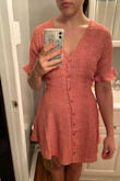 I waited MONTHS for this to be restocked so when I finally saw it in my size I jumped on it before it sold out again. I just received it today and couldn't wait to try it on. The material, color, and print are phenomenal, and I love that it's fully lined! However, when I tied the waist I could immediately tell that something was off... the buttons on the skirt were pulling to my right side and were not sitting straight. I had my sister re-tie it for me to make sure it was centered but had the same issue. I traced the seams on the side while wearing it and found that the issue is that it wasn't cut evenly - the left side sits perfectly straight but the seams on the right twist towards the back, pulling the whole skirt to the side. My guess is that there was a rush in production and quality control was the sacrifice. I'm pretty bummed that I have to return this, I want to get another but who knows how long that will take or if it will even be better. - Breann K.