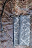 Been eyeing this for a while, got the black as a final sale and glad I finally did! Love that you can remove the strap and use it as a clutch and it has more storage space than it appears. Can't wait to wear it out! - Liesl Z.