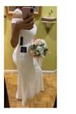 Bought this dress for my upcoming civil wedding. I am totally in love with it. It's beautiful made. Material is good quality. The fit is the bum. Shipping took just a few days. Packaging was very neat. The shipping was free which is a bonus. I highly recommend this dress. - Sandy S.