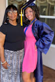 My daughter wore this for graduation. The small was a little too long and loose for her but the color was gorgeous. - Kimberly M.