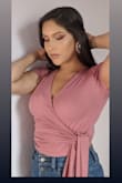 The top is super cute, I really like the wrap detail. It looks good with high waisted jeans or shorts - Monique P.