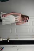 I bought this as a graduation dress and it looks so cute!! The babydoll Shape is adorable and it's not see through. - Sarah B.