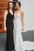 These were our bridesmaids dresses for my sister's wedding. I originally ordered a medium (my normal size) and it was too big overall. Returned it and ordered both a SM and XS. Ended up keeping the SM - the XS was too tight around the waist/bust. The SM was great fit (I ended up getting the straps tightened by a tailor). Tight enough where you feel secure but not too tight. Easy to move and dance in. Flattering on most body types (since it was a bridesmaids dress). My recommendation would be to order two sizes - your normal size and one down, and return one. - Rachael M.