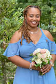 This is my bridesmaid dress. My bust is just a little too big for the dress. The dress flows very well. Although I used safety pins to close the cleavage the dress was still amazing. Received so many compliments. - SHANA R.