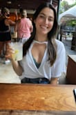 This v-neck looks great with a bralette under it! A bralette or something like it is 100% needed tho. You can't wear this shirt without one. - Alexandra R.