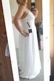 I love it! Fit perfectly and I feel super comfortable! I don't feel like I need to suck in my gut all day. It arrived within 2 weeks (even during covid19) and I couldn't be happier with the price and shipping price. I can not wait to wear it on my wedding day in a month - Jessica J.