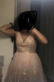 I ordered this dress for my birthday in size S and it fits great. It was super comfortable. The top fits a little large but nothing that can't be fixed. - Marianny M.