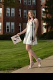 I ordered this for college graduation. I really liked it and it fit good. It went out a little like I wanted. It was just a little big in the bust area. It was more the straps were too long and made the bust area not as tight. I think if I could've got the straps tightened by someone that sews it would've been better. I have this problem a lot though because my torso is very short. - Lauren H.