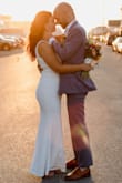 Wore this beautifully simple dress for my wedding. Stretchy material so I went with a Medium. Length was a bit short for my height and I wore flats. Definitely recommend. - Kate C.