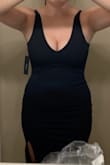 The material is stretchy and hugs all of the right places. It is modest, yet reveling just enough. It is such a comfortable dress and I plan on ordering it in the other colors. I typically order a M, but went with the S as it was the only option and it fits perfectly. - Alicia N.