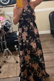 I think this is so cute and flattering. I am 61 years old and not very curvy. The armholes are a little loose but my waist is big for my size so in my case I would stick with the medium. It is very long. I am almost 5'7" tall and will have it hemmed so I don't have to wear 4" heels, but I think it is worth it. I feel pretty in it. - Teri W.