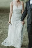 The dress was perfect! I ordered a small. Kept it on all night because it was so comfortable. It has a slight stretch to it. I've received so many compliments! - Krista W.
