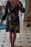 This dress is just what I was looking for, loose and light for a July wedding. The wrap belt sits in a great spot and the length is perfect, not too short and not awkwardly long. My only issue is the bust is a little loose on me, I may use 2 sided tape to keep the girls from making an appearance but you could also wear a tank under it if you wanted. - Pamela W.