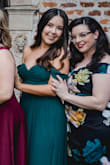 This dress is amazing and I'm kicking myself for not getting it in other colors while it was in stock. It cinches really well at the best part of the waist and then drapes over the arms. I got so many compliments on it and the color is really gorgeous. I have a small bust so a S was perfect. - Charlotte S.