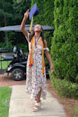I was SO excited for this dress. It's so super cute and very comfy. I love how flowy it is and the slits on the legs are just the right amount of classy and sexy. I wore this for my graduation, and it was so light. Looks great with a pair of wedges! - Morgan D.