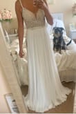 I purchased this dress because I needed one for my intimate ceremony due to covid. This dress is absolutely beautiful and VERY high quality. I am impressed with the material, design and price. - Maureen G.