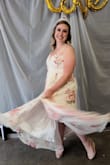 This dress is so beautiful and that's exactly how it made me feel! The sizing was perfect and I loved that it was a wrap dress so it is adjustable if needed. I wore it for my bridal shower and everyone loved it! It was so comfy and just the right amount of flowy! - Kaitlin