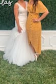 Bought this dress to wear to an outdoor wedding in June and it was perfect. I received several compliments! I paired it with white block heels from Lulus to complete the look. The v neck was low so my bra would show when I sat down so I'd probably pin it next time. - Lacey G.