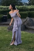 SUCH a beautiful and classy dress! I wore it to my sister's small wedding and I got so many compliments, I was overwhelmed. For the quality of the dress, I would say it should be a $400+ dress so the price is really a steal! My ONLY complaint is that this dress is sooo long, it's like it was made for someone 6 ft tall. Everything else about the sizing was perfect! After hemming the bottom, I was good to go and ready to dance the night away. Highly recommend! - Leila N.