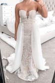 Absolutely LOVE this dress and the quality. My wedding got postponed d/t COVID-19 but we're stilling getting married on our original wedding date so I purchased this dress for that but I low key wish it was my actual wedding dress. I was originally looking for a dress that could have the two in one affect and haven't found anything I liked at bridal salons, but this dress is literally perfect. I'm obsessed. Only thing is that I'll need to have it altered because it's a little long for me since I don't plan on wearing heels with it. - Madalina P.