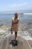 Perfect little summer dress! It does fit a little small, consider sizing up if you want a loser fit or are in between sizes, and you can use waist sash to adjust the fit as you like. The linen fabric is great quality but as described does not stretch. I chose to tie the waist sash in the back but can be worn either front or back. I paired it with white sandals I also got from Lulus, perfect outfit for brunch date by the beach. - Yentl-Loulou M.