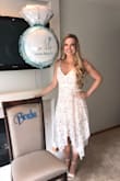 I wore this dress for my bridal shower and received many compliments. It's beautiful, comfortable, and fits true to size. - Julie T.
