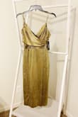 I love all the dresses from Lulus. They are always so well made. This dress is midi length and a little long on me since I'm short, but I plan to have it hemmed so it looks better on my body length. It's soft and has a slip underneath. Such a great deal for a fancy looking dress. I love that the straps are adjustable. - Anatolia B.