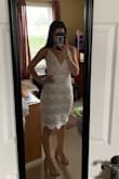 This dress didn't fit me as well as the other extra small I ordered from this site! I think it was because of the different material! it was longer than I expected it to be & too big and unfortunately had to return it. Also where the beginning of the zipper left a bump by your lower back once it was all the way zipped up and looked funny & there was no way I could try and fixed because it kept on riding up. - Sierah M.
