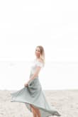 I LOVE the look of this skirt! It is so flowy and beautiful. It does wrinkle easily though. I am normally a small or medium in skirts/pants but went with a smaller size based on reviews. So happy I did!! - Ashley P.