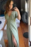 I bought this dress for my engagement photos and it's absolutely perfect! It is really long so considered that if you're short like me. I hemmed it up to fit my petite height. I was able to wear a regular unpadded bra without it showing or feeling too low cut. The quality and color are amazing!! Would recommend!!! - Caitlin W.