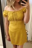 I bought this dress to wear to a fiesta party. It was super cute. I received so many compliments. The sleeves were comfortable, didn't rise up like a lot of off the shoulder tops do. The zipper is tough to zip up, but I noticed the zipper is like that on other clothing items I've bought from Lulus. - Erika R.