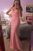 I ordered this dress to wear it to my boyfriends senior prom. The color is so beautiful and it fits just as I hoped it would. I am wearing 2.5 in heels and I can walk perfectly in this dress. It is not too long or too short. The dress hugs my body and I don't need to wear bra. - Katelyn E.