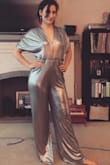 I needed a very specific disco romper and this fits the bill perfectly.  It's bright, it's shiny and easy to move around in! I was worried it might not fit my bodacious booty, but it fits and makes it look fantastic! - Elizabeth R.