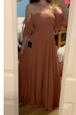 I had been eyeing this dress for awhile and I finally bought it. The fabric is a good quality and the way the skirt falls is absolutely gorgeous. It's very fancy/formal, so I'll have to wait for a special occasion to wear it. It's a bit long but I think I can make do without getting it hemmed if I wear heels. I bought a Small instead of my normal size Medium, so it's a bit tight but I could still squeeze into it even after dinner. The only downside was the pads in the bust. They are a bit awkward for me. From the side especially it's quite obvious they're there (you can't really tell in the picture because of the lighting, but they stand out especially in direct lighting). They don't flatter me and the shape sticks out. I'll have to look into removing them. - Kara G.
