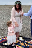 We decided to have a small intimate ceremony on our original date, 7/11/2020. My dress for our original wedding hadn't been altered and was a bit over the top for a small beach ceremony. I was so glad to have found this dress! It worked out perfectly for the occasion. I will plan on wearing it again next year for our rehearsal dinner. (bonus, it has POCKETS!!!) - Jennifer R.
