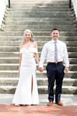 I absolutely loved this dress!  Simple but still sexy.  Perfect for the small ceremony my husband and i had to get married.  I did have to get the dress hemmed because I wasn't wearing heels.  I got a ton of compliments! - Lisa K.