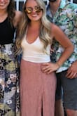 Originally ordered the xs and it was very tight in the armpit area. Which never happens for me being so petite. But I loved it I had to order it again in the right size. It is so comfy and flattering and its dual-layered so cant see through it - Alexis C.