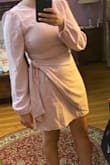 This dress fits true to size, it's super flattering with the tie waist and is made of a nice thick material. I purchased it thinking that it would be a bit more light-weight and summer appropriate but I think this is more of a fall/winter dress (i would sweat right through it in the summer) It is short and cute but not too short. It isn't steamed in the photos I am attaching but once I steamed it and got the wrinkles out it was even more flattering. Color matches the pics online. - Mary Y.