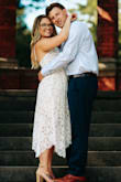 I LOVED this dress, I got so many compliments for our engagement pictures! I am pretty short, and have a larger bottom so I sized up to a medium to make sure it wasn't too snug around my hips. It fit perfectly, and looked amazing in our pictures! 10/10 would recommend. - Brenna B.