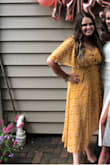 I highly recommend this dress! The fit was spot on and the length even worked for me (which normally tea length does not because I am 5'2"). The slit made this super cute and trendy! I did have to safety pin The chest because it was a little too much exposure for me, but otherwise it was great! - Michelle M.