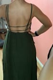 The dress itself is flattering: nice material, color, and cut. I love open-back dresses.
It's a bit too long but that's okay if I wear heels. The top part is too baggy unfortunately. I had to buy body double tape to avoid exposing my breasts but it does not work so well. I'll just have to be extra careful. Also, the strips keep coming off my shoulders. - Di G.