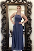 I wore this gown for a wedding, just as a guest. I LOVE the open back, I got so many compliments on it. I did have to get it tailored because of the length, even with heels on it was too long. 
Only bad thing about this dress was myself..I someone managed to rub up against some spilled champagne and my dress was stained. It was very difficult to get out, and it was super noticeable. BUT, take it to the dry cleaners after and it's as good as new. - Holly R.