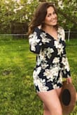 Gorgeous floral romper. I got a small, but a medium would have fit too as a looser style.  It is long enough so that it provides appropriate coverage. - Rachel S.