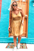 I got so many compliments! The mustard color is trendy and the material is PERFECT for the hot weather! But I can pair it with a cardigan this fall :) Favorite purchase! - Cailyn H.