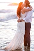 The material and dress in a whole feels not too heavy but not lightweight like a cheaply made dress. It was absolutely perfect for my elopement on the beach! It fit me perfect. I only had to have it taken up a bit in the front about 4 inches as I did not wear heels/shoes to my ceremony. I am SO happy I waited and purchased this dress. - Dezmarie T.