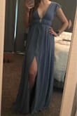 I bought this dress and my husband and I love it. It fits beautifully. Great weight for summer events. Can't wait to wear it out with my husband. - Marissa K.