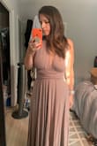 I love this dress! I haven't worn it to the wedding yet but I am very excited to. The dress is extremely comfortable and I would highly recommend it for brides that want their bridesmaids to "match" because it can be worn slightly different ways. I also love the color which is very close to how I imagined it. The length is pretty perfect on me with a 2"-3" heal but would be too long without a heal. The one down side is that the skirt is quite heavy and I image it will be hot for the outdoor summer wedding, it also sort of pulls at the waist a bit and drags it down but i think that is mostly because the waist feels a bit loose on me. I recently lost 50 lbs so I ordered relatively blindly and in a rush because the wedding plans were changed because of the pandemic. - Jenna B.